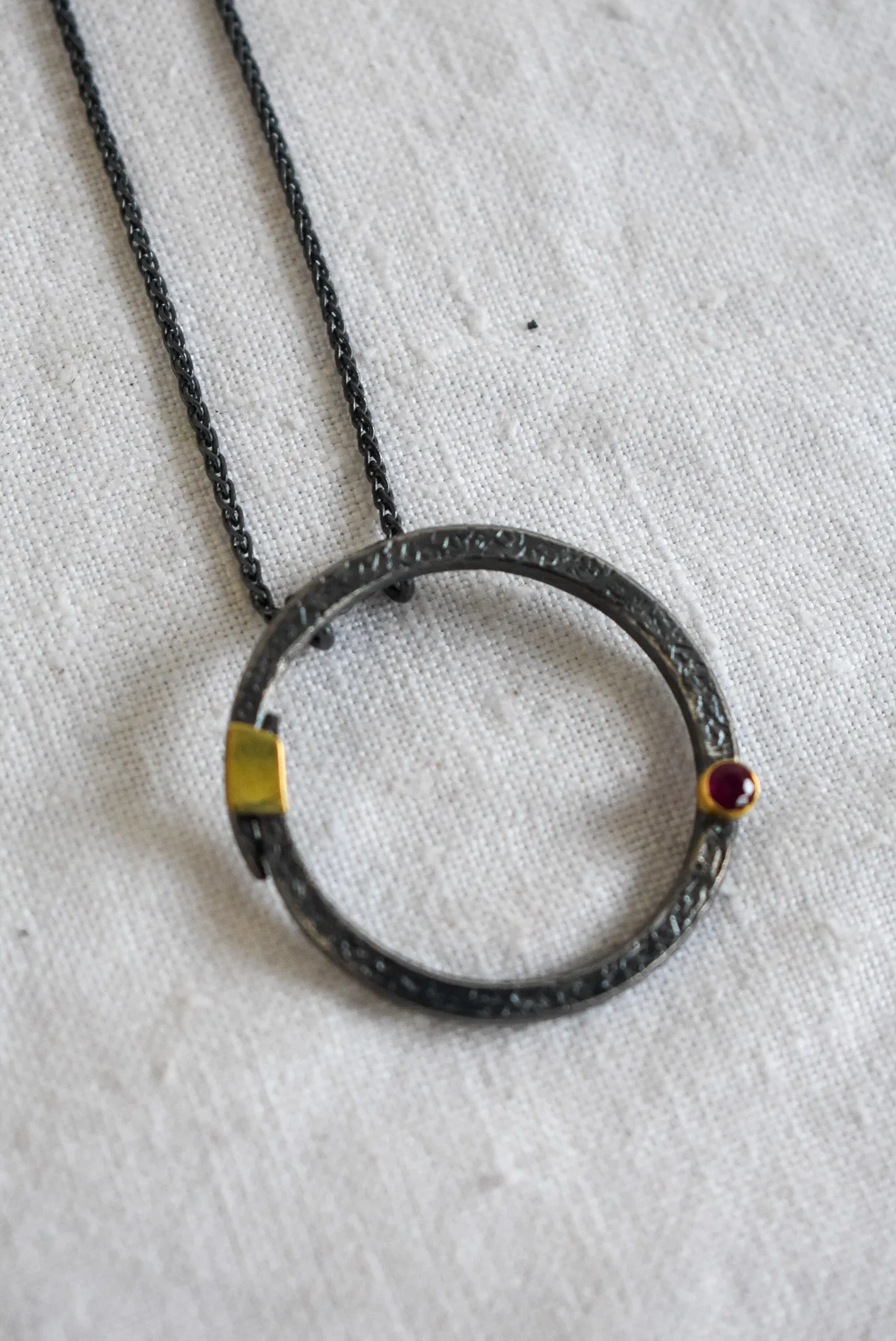 Bob Wyber Silver   22ct Gold set ruby small circle necklace