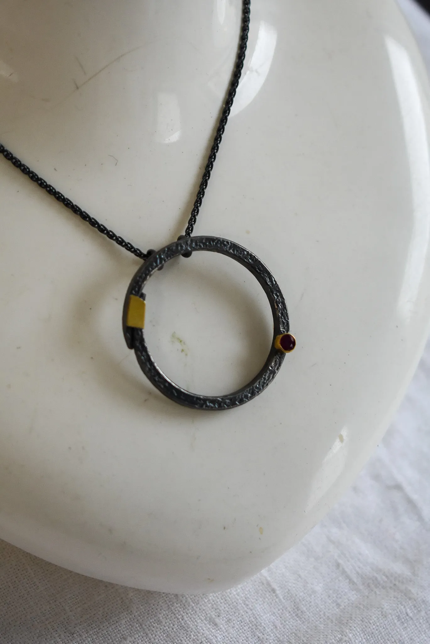 Bob Wyber Silver   22ct Gold set ruby small circle necklace