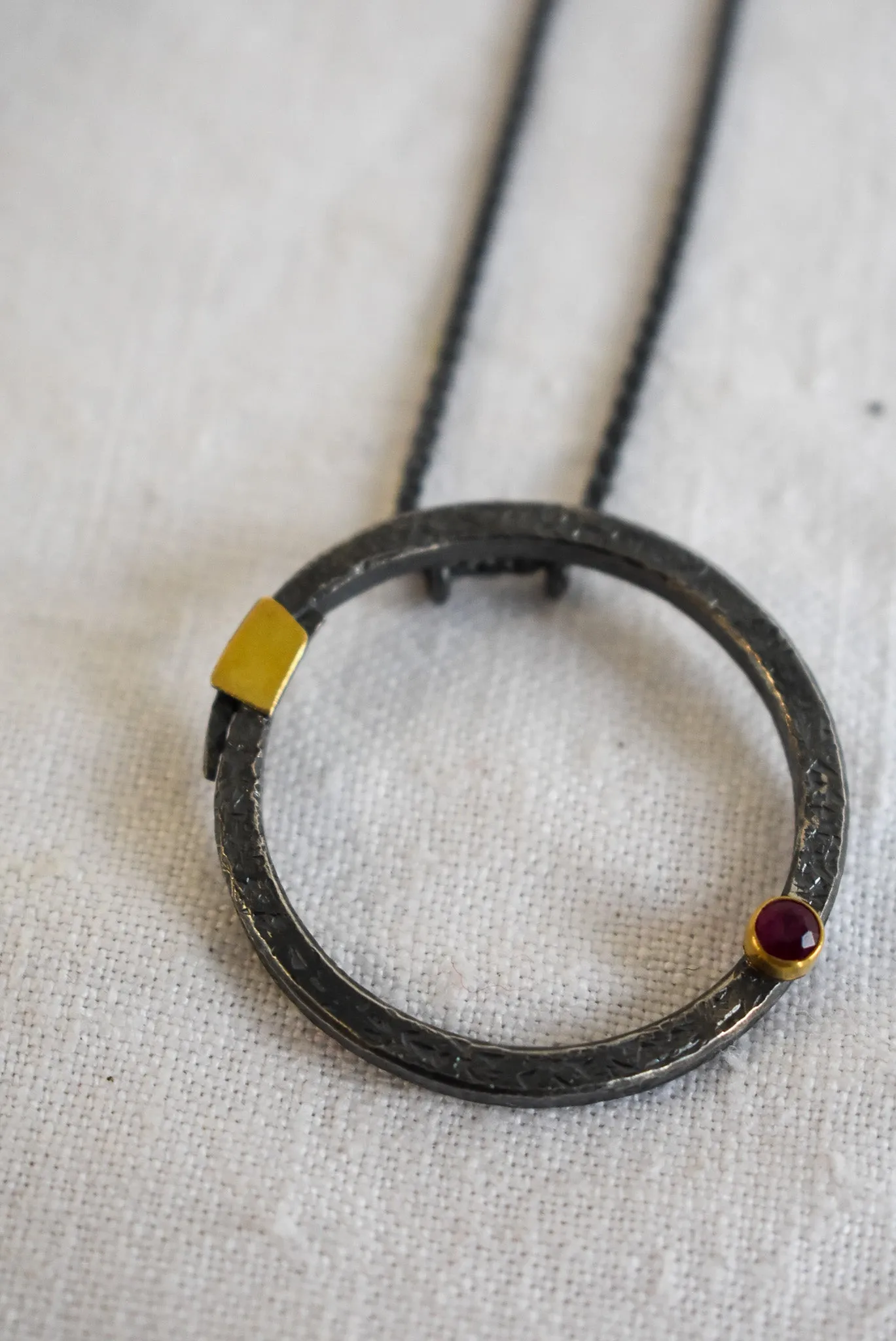 Bob Wyber Silver   22ct Gold set ruby small circle necklace