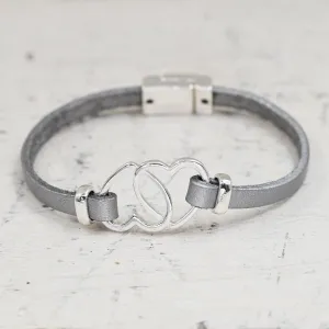 Entwined hearts on simple leather bracelet w/mag clasp