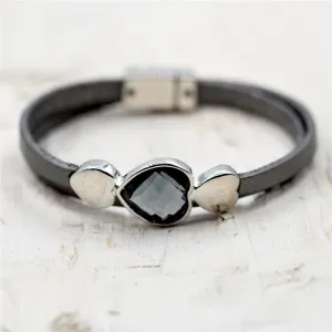 Facetted heart stone on wraparound leather bracelet