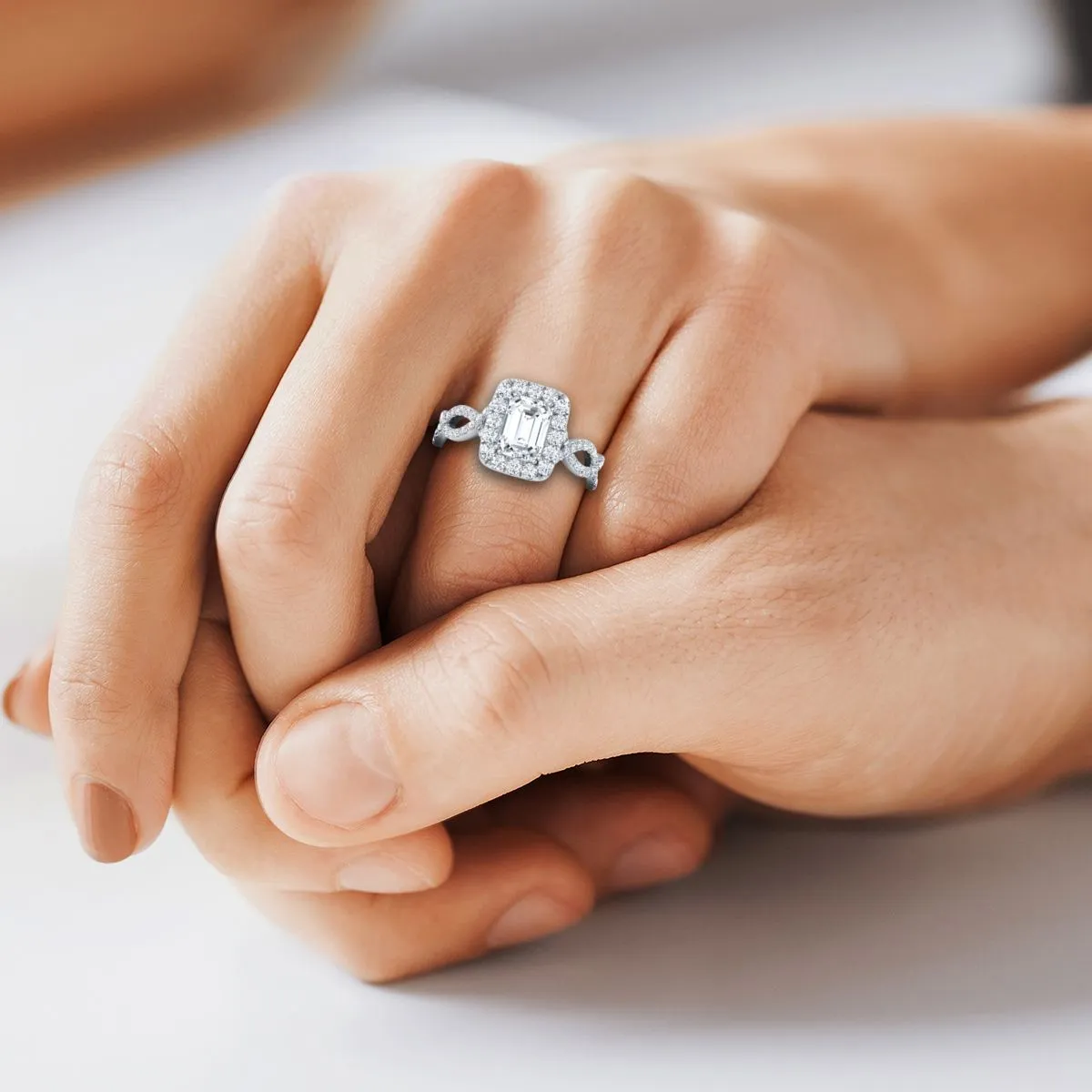 Platinum Emerald Cut Diamond Ribbon Twist French Pave Halo Engagement Ring -3/4ctw