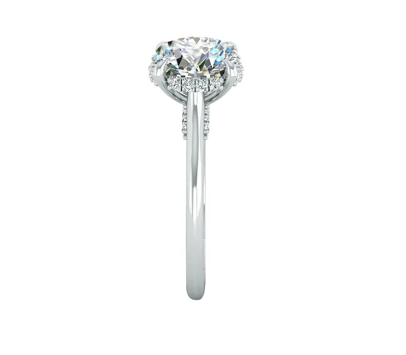 SPARKLE SOLITAIRE WITH PAVÉ-SET DIAMONDS AROUND THE HEAD